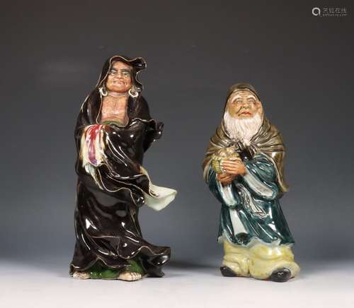 Japan, twee geglazuurd aardewerk figuren, 20e eeuw,