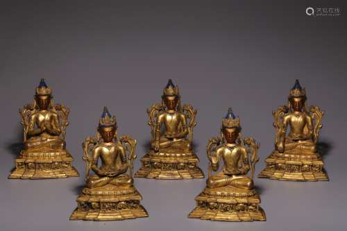 In the Qing Dynasty, a sitting statue of a five-sided Buddha...