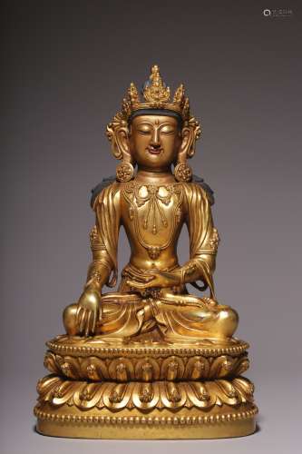 In the Qing Dynasty, a sitting bronze gilt statue of Dari Ta...
