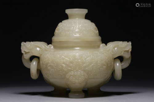 In the Qing Dynasty, Hetian white jade animal face pattern d...