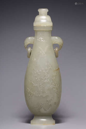 Qing Dynasty, Hetian white jade vase with flower and bird pa...