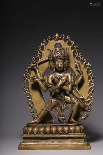 In the Qing Dynasty, a statue of Guanyin with six arms inlai...