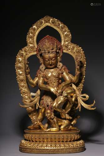 Ming Dynasty, bronze gilt Buddha statue with four arms and t...