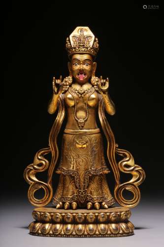 A bronze gilt statue of Zakiram, the goddess of wealth, in t...