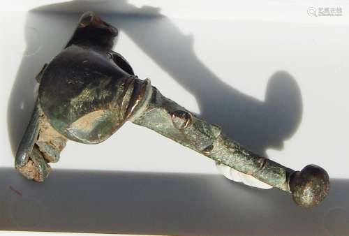 Roman trumpet brooch with representation of a face (RRR)