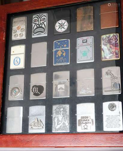 Collection of 20 ZIPPO lighters in collector box (glass dama...