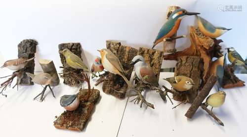 Mix of fully plastic songbird bustards,each attached to a tr...