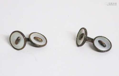 Pair of cufflinks with mother of pearl trim