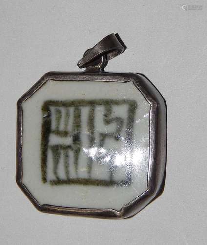 Pendant with porcelain inlay with characters