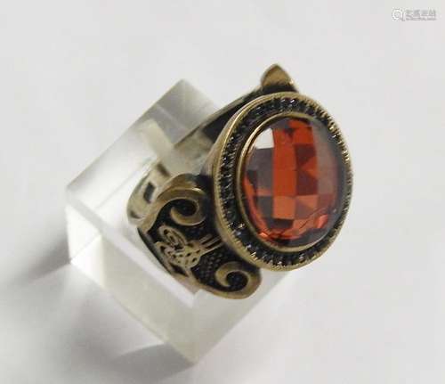 Ladies ring with cut glass stone