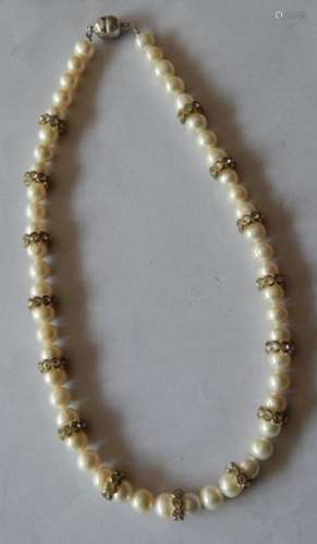 Pearl necklace decorated with glass stone elements