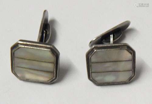 Pair of cufflinks with mother of pearl inlays