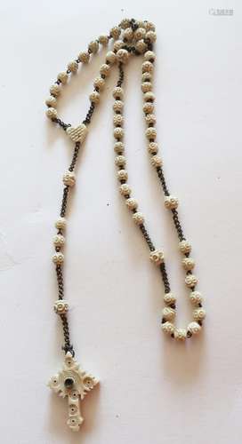 Rosary with carved leg beads and cross