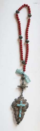 Rosary with red carved beads and large cross pendant with en...