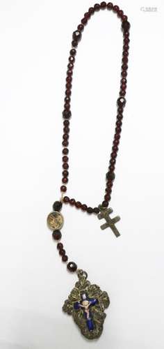 Rosary with cut garnets and filigree pendant with enamel rel...