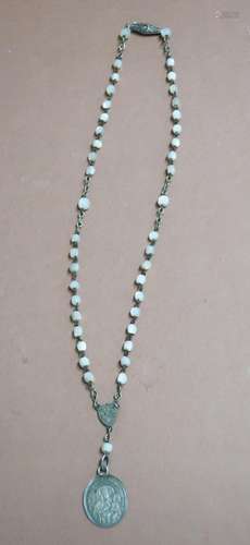 Small rosary with mother of pearl beads and 800 silver clasp...