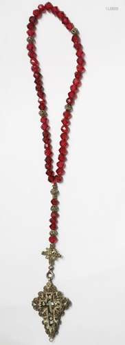 Rosary with cut red glass beads and filigree pendant with in...