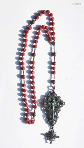 Rosary with dyed and carved leg beads and a large