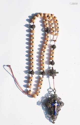 Rosary with beige glass beads and filigree worked silver ele...