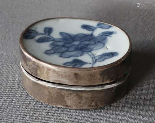 Oval lidded box with floral porcelain plate
