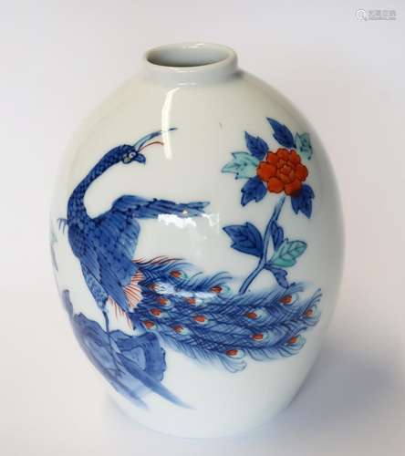 Flower vase with peacock decor