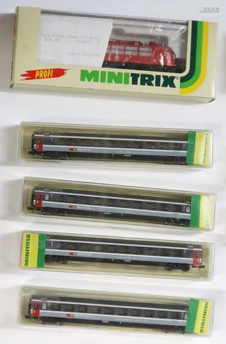 Minitrix electric locomotive model no. 12890 and 4 passenger...