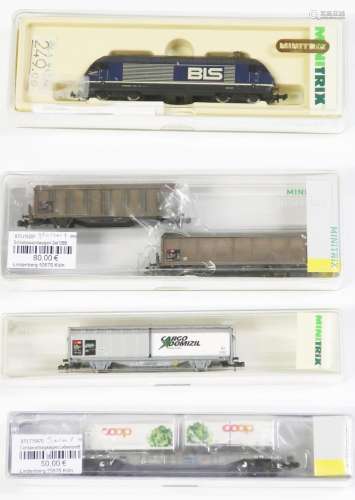 Minitrix electric locomotive model no. 12681 and 4 freight c...