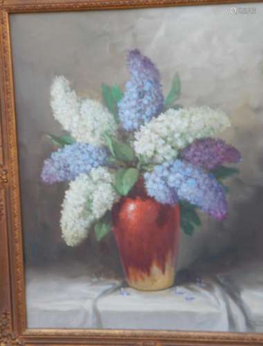 "Bouquet of flowers with white and blue lilac in a vase...