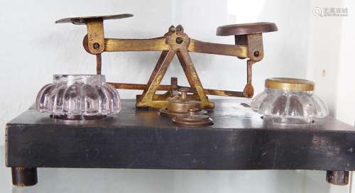 Ink set in the form of a letter scale with 2 small weights,b...