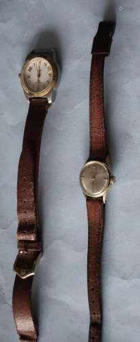 Convolute 2 wristwatches, including the brand Tissot, brown ...