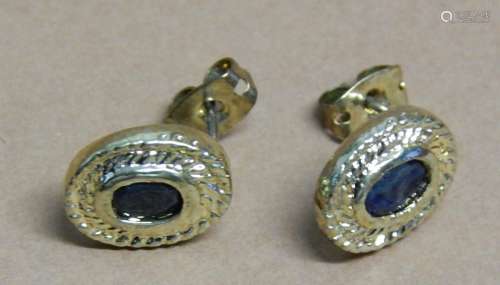 Pair of oval stud earrings with blue glass stones