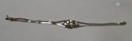 2 row ladies bracelet with white pearl and 4 dark stones