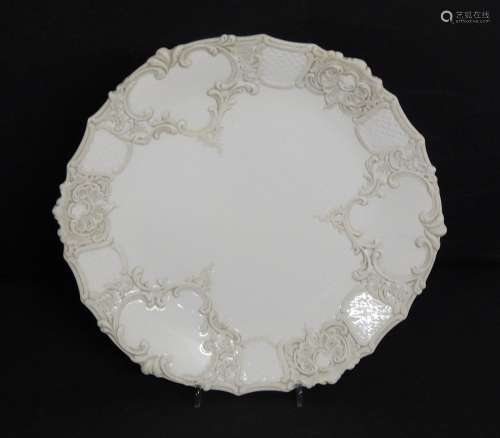Porcelain plate with floral half reliefs