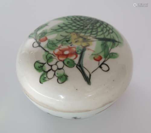 Lidded box with decoration of a cherry branch with a small b...