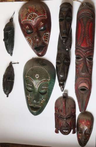 Convolute 8 masks,maximum length ca.60cm,african woodcarving...