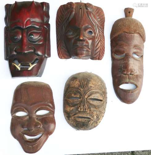 Convolute 5 wooden masks,partly African, partly East Asian h...