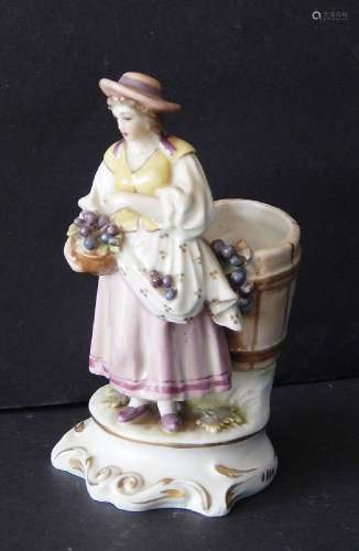 Porcelain figural "Grape Harvester", bottom marked...