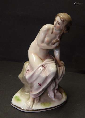 Figural porcelain "Sitting nymph taking a bath",bo...