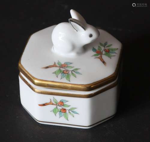 Lidded tin with rabbit