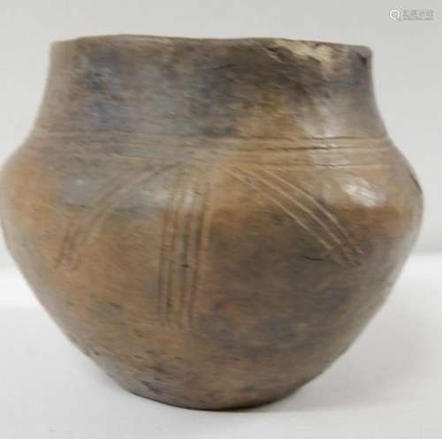Bellied vessel with neck set off by double grooves and patte...