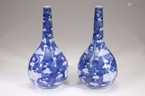 A PAIR OF BLUE AND WHITE 'PRUNUS AND CRACKED ICE' BO...