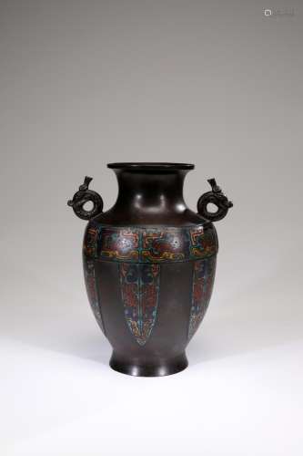A CHAMPLEVE 'ARCHAISTIC' VASE