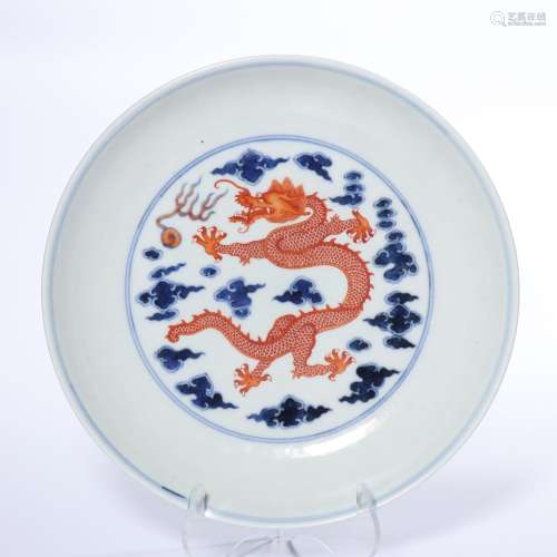 A COPPER-RED BLUE AND WHITE 'DRAGON' DISH.MARK OF QIANLONG