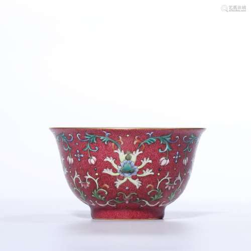A RUBY-GROUND FAMILLE ROSE CUP.MARK OF QIANLONG