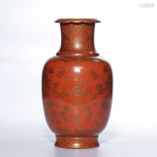 A COPPER-RED GROUND GILT-DECORATED 'DRAGON' VASE.MARK OF QIA...