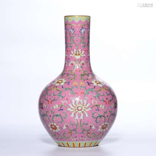 A RUBY-RED GROUND FAMILLE-ROSE VASE.MARK OF QIANLONG