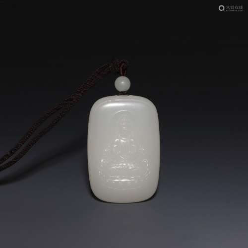 A CARVED WHITE JADE PENDANT