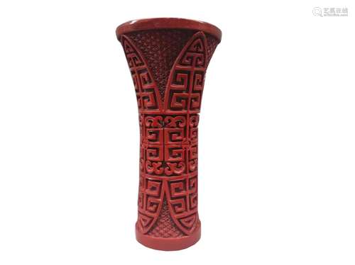 A CARVED CINNABAR LACQUER VASE.REPUBLIC PERIOD