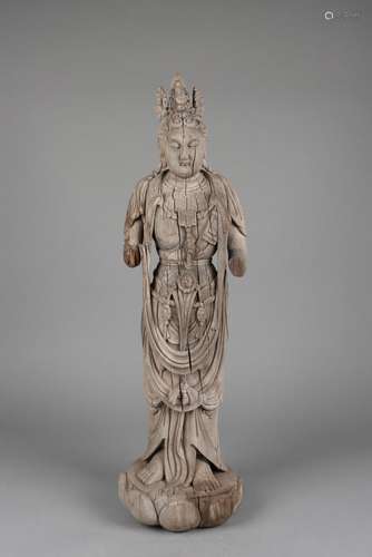 A CARVED WOOD STANGING GUANYIN.TANG DYNASTY