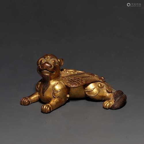 A GILT-BRONZE BEAST.TANG DYNASTY